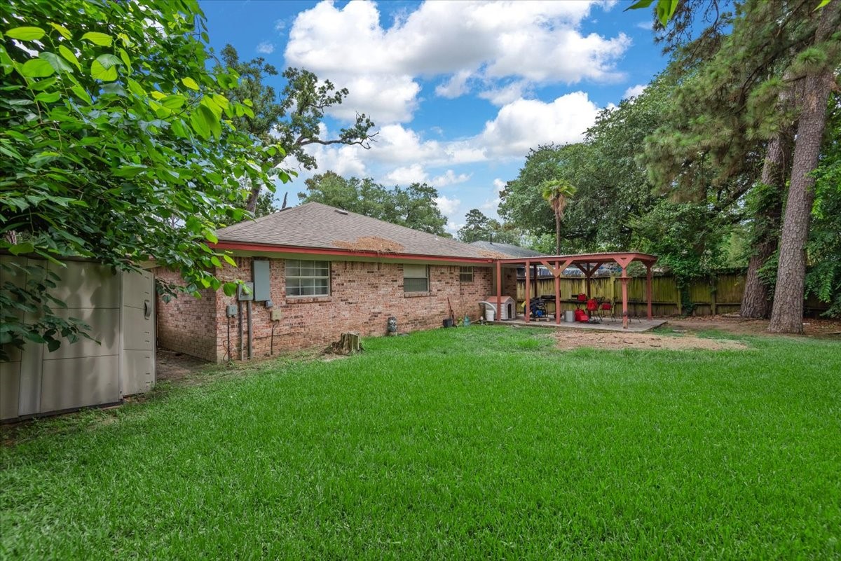 23011 Bayleaf Drive Spring, TX 77373 - Photo 22 of 22 a view of a house with backyard and sitting area