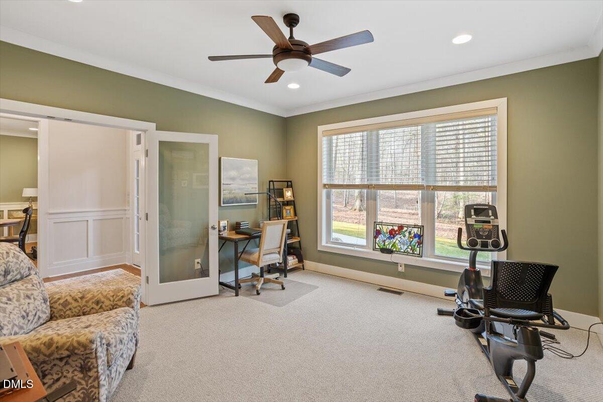 31 River View Court Timberlake, NC 27583 - Photo 11 of 44 a view of a livingroom with workspace and a window