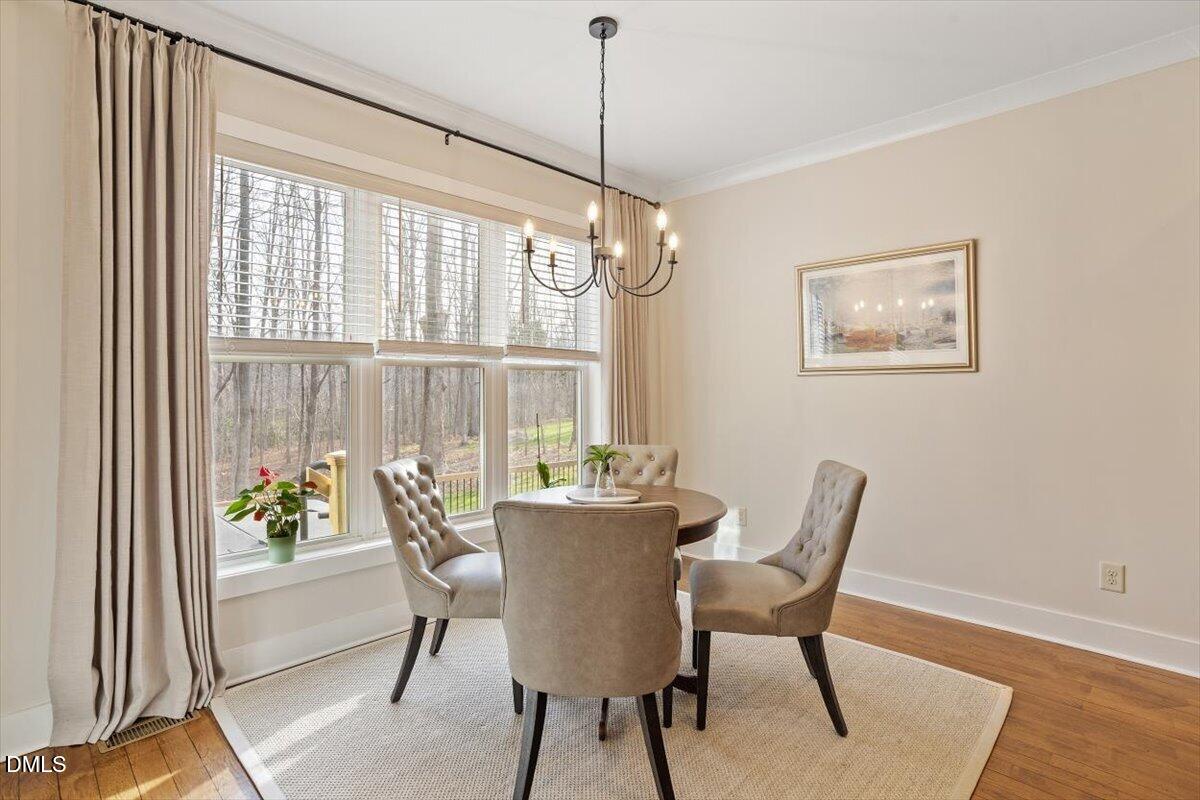 31 River View Court Timberlake, NC 27583 - Photo 17 of 44 a view of a dining room with furniture window and outside view