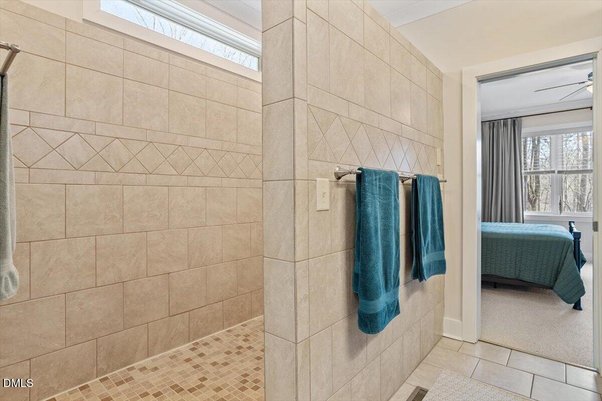 31 River View Court Timberlake, NC 27583 - Photo 26 of 44 a bathroom with a shower