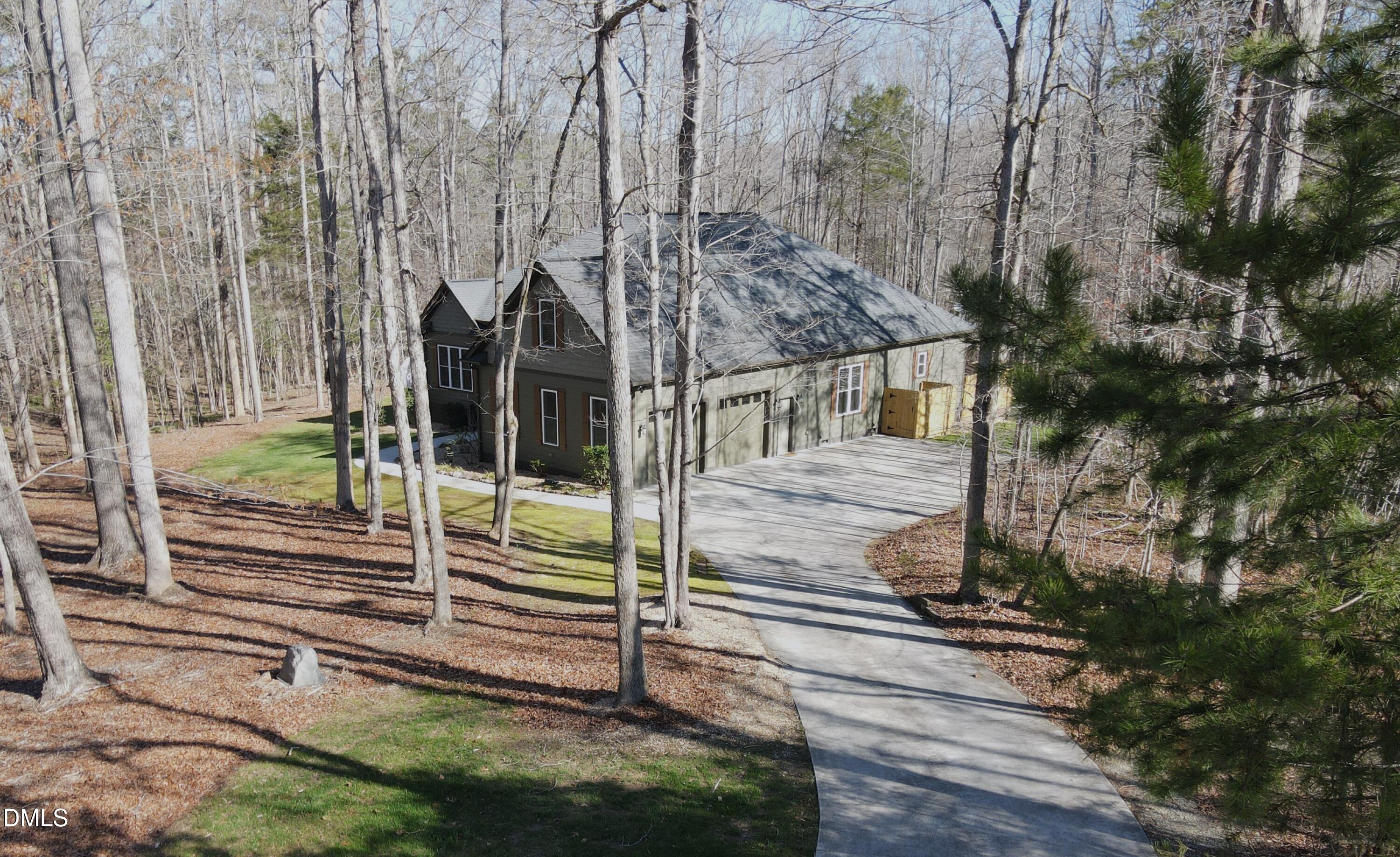 31 River View Court Timberlake, NC 27583 - Photo 41 of 44 a view of a house with a yard