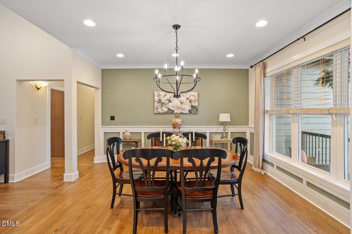 31 River View Court Timberlake, NC 27583 - Photo 7 of 44 a view of a dining room with furniture window and wooden floor