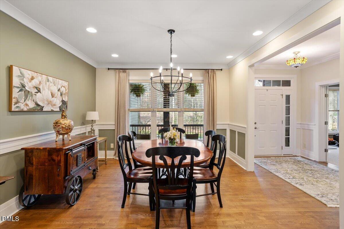 31 River View Court Timberlake, NC 27583 - Photo 8 of 44 a view of a dining room with furniture window and wooden floor