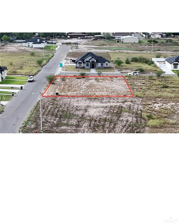 9 James Street Rio Grande City, TX 78582 - Photo 2 of 5 a black and white photo of a lake