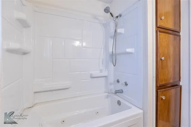 a bathroom with a bathtub