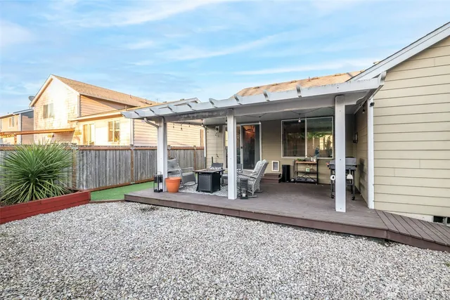 a backyard of a house with seating space