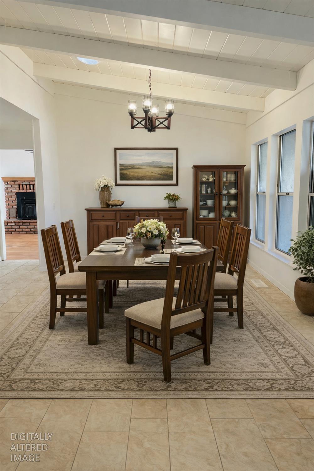 581 Haines Road Auburn, CA 95602 - Photo 4 of 52 Large formal dining room with oversized tile, windows and solatube for natural light.