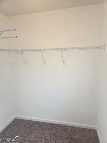 a view of small space with racks on the wall