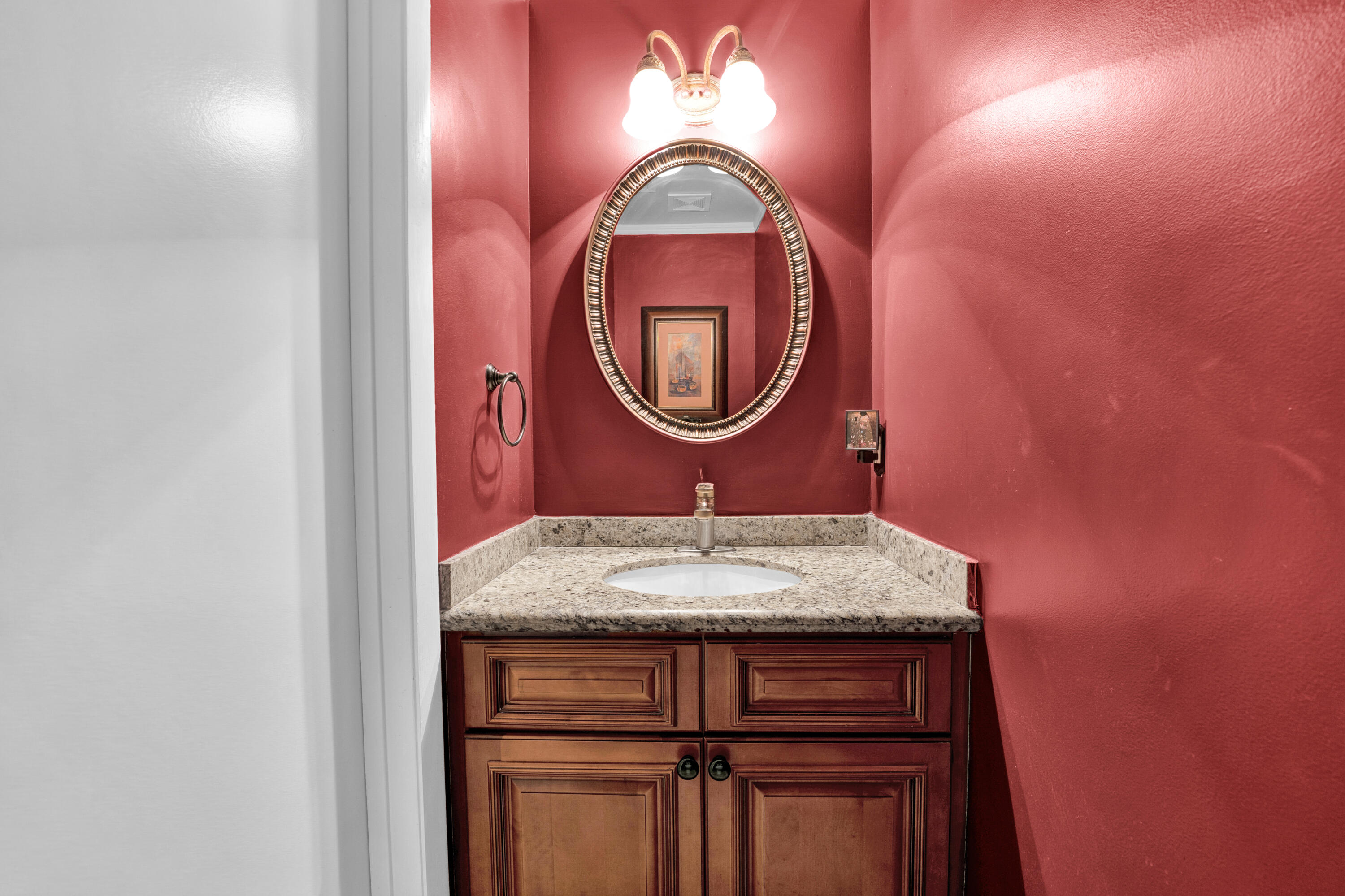 22211 Clocktower Way Boca Raton, FL 33428 - Photo 29 of 38 a bathroom with a sink and a mirror