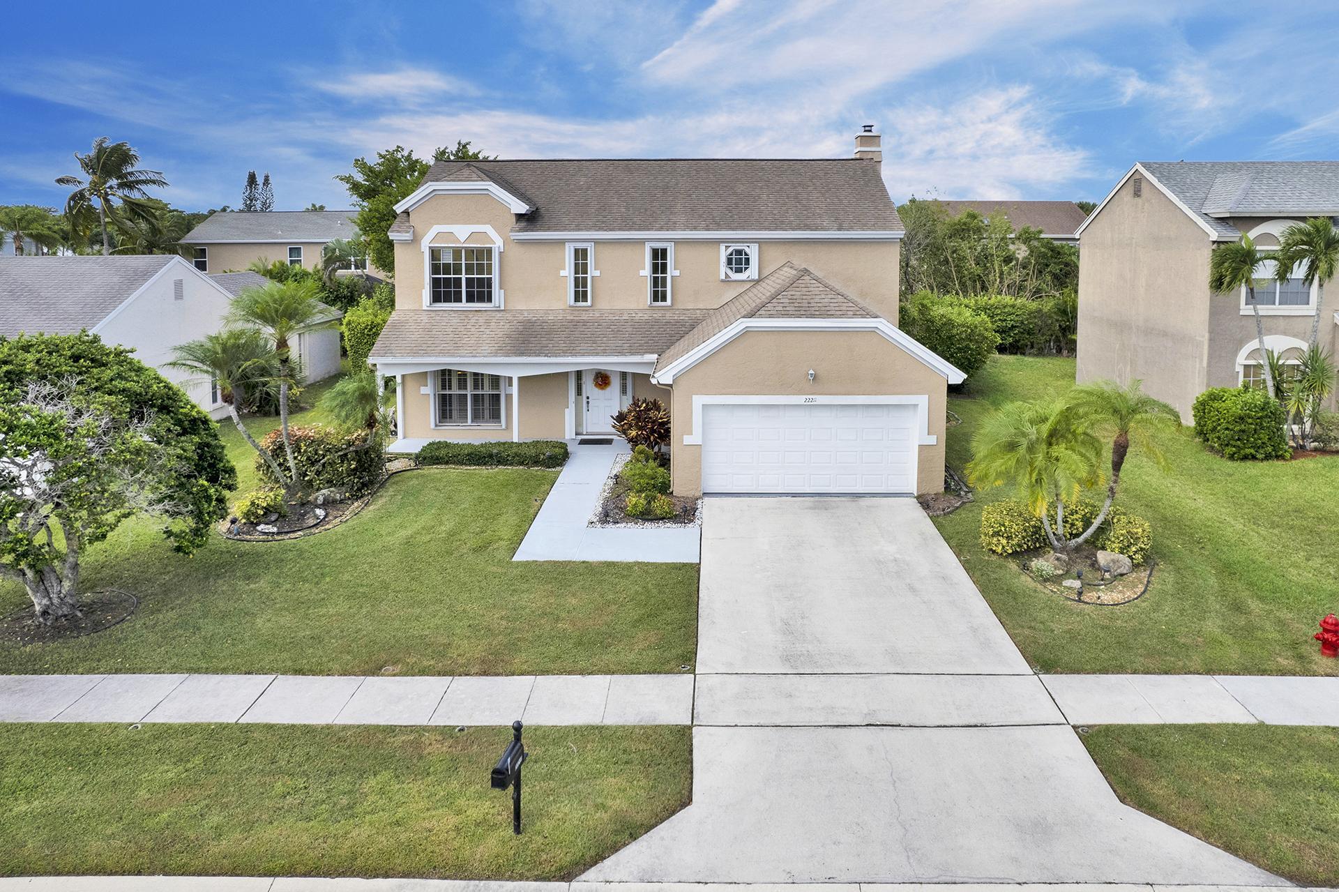 22211 Clocktower Way Boca Raton, FL 33428 - Photo 3 of 38 a aerial view of a house with a yard