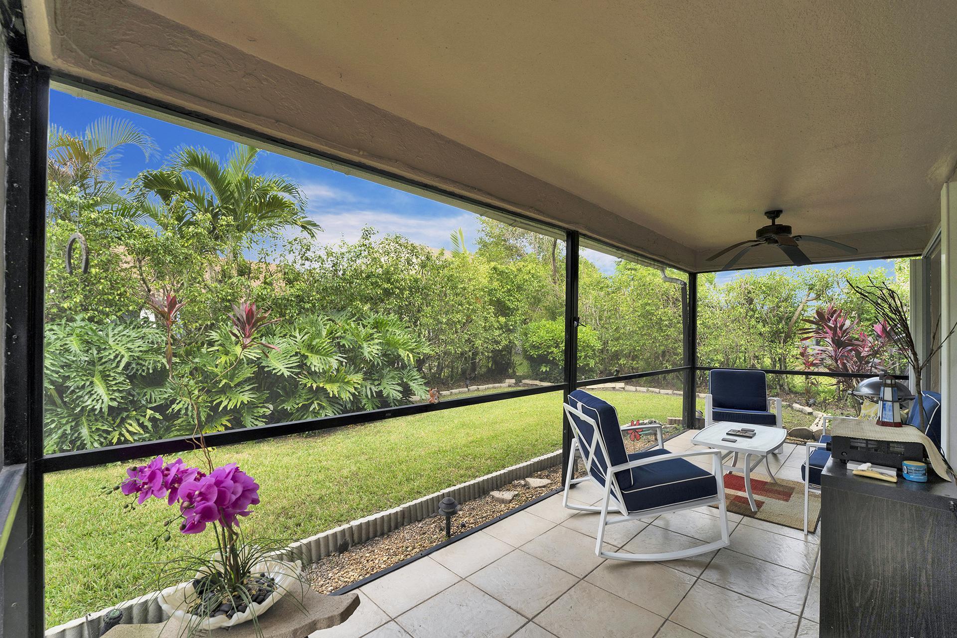 22211 Clocktower Way Boca Raton, FL 33428 - Photo 31 of 38 a outdoor view with a sitting space