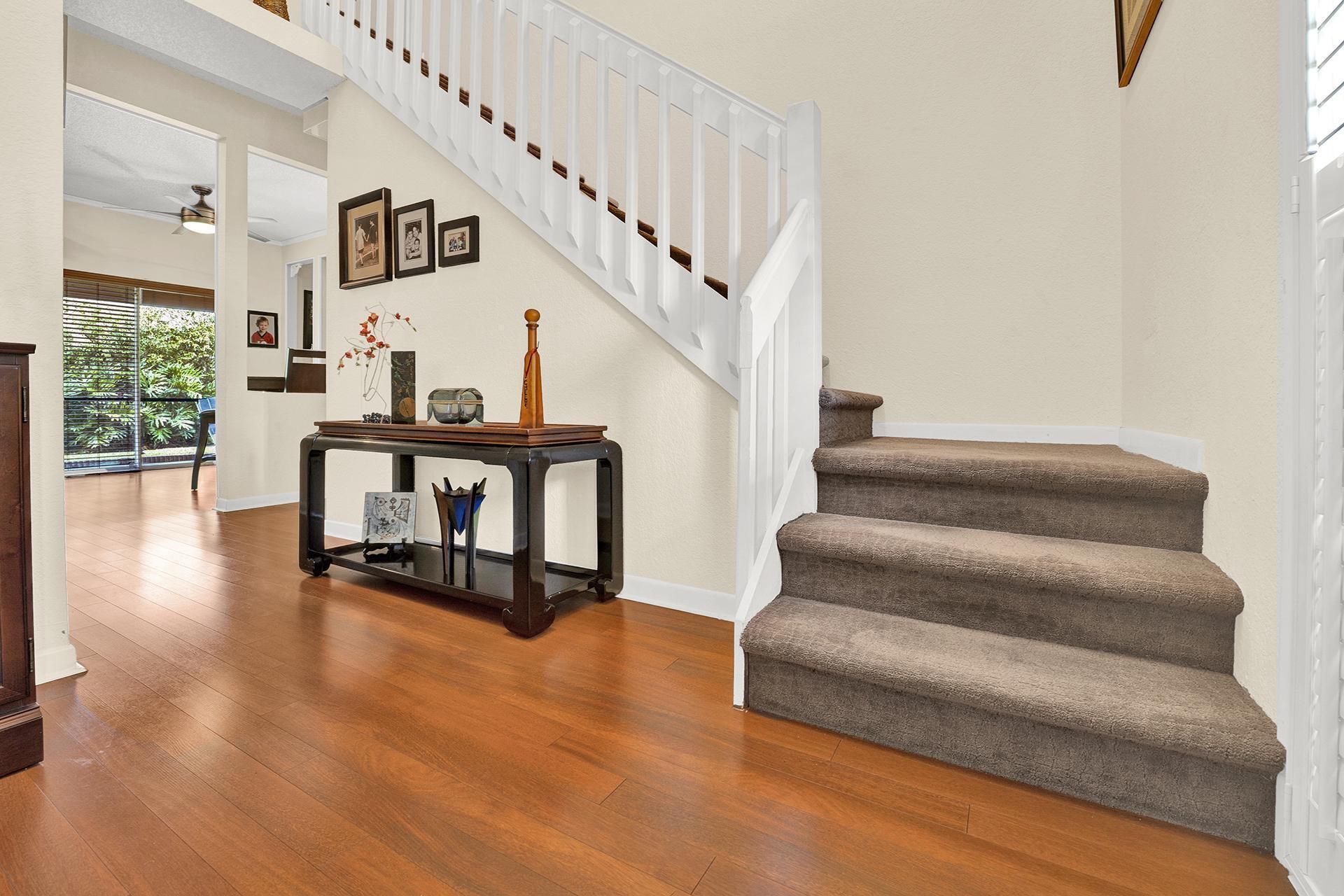 22211 Clocktower Way Boca Raton, FL 33428 - Photo 7 of 38 a view of entryway and hall with wooden floor