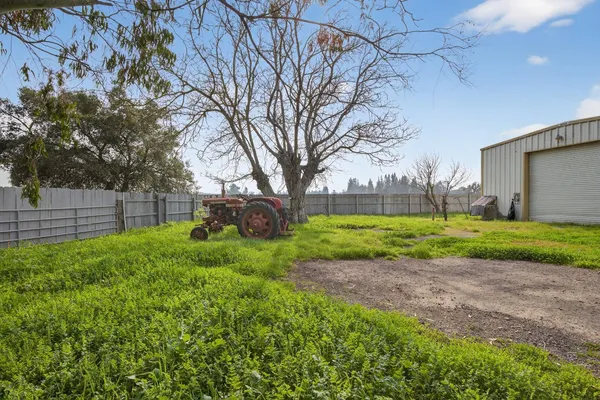 a view of a lake with a big yard