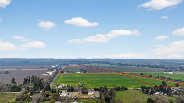 a large building with an ocean view