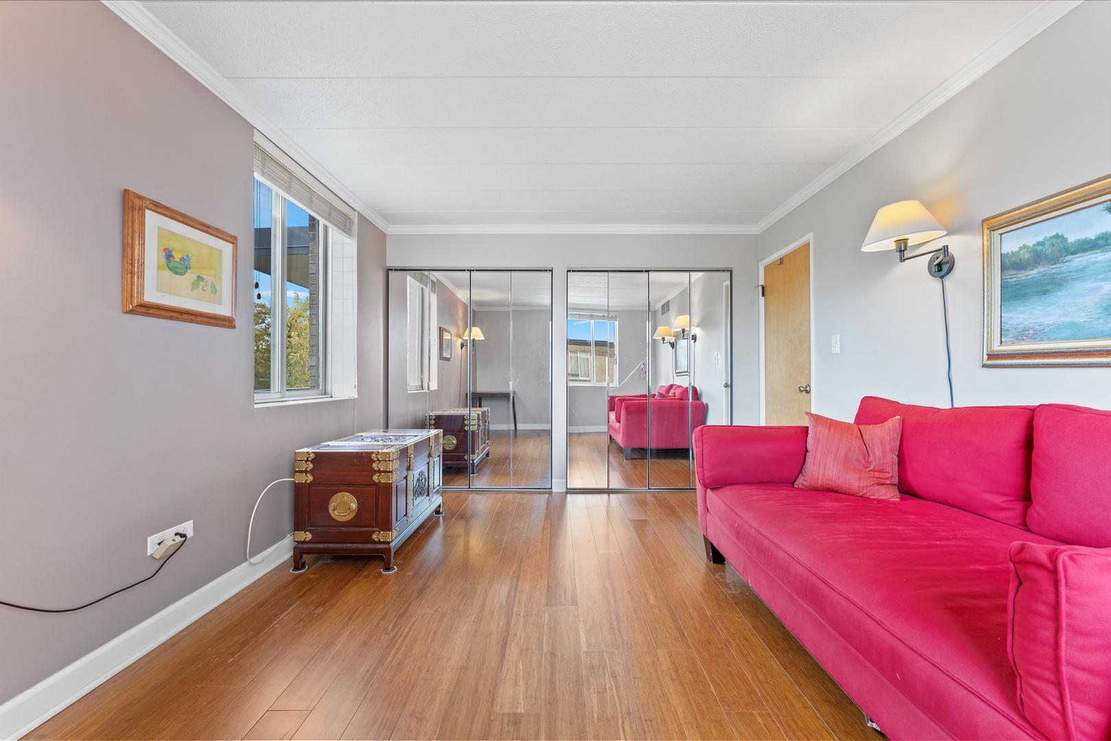 110 West Butterfield Road, Unit 502S Elmhurst, IL 60126 - Photo 15 of 31 a living room with furniture and a wooden floor