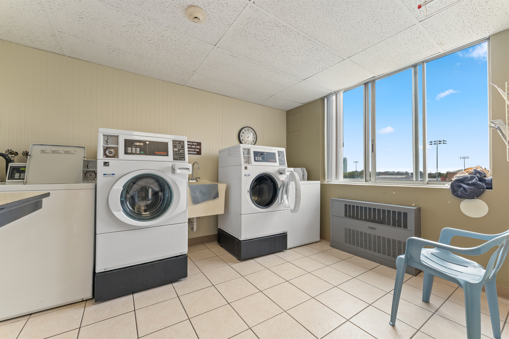 110 West Butterfield Road, Unit 502S Elmhurst, IL 60126 - Photo 20 of 31 a utility room with dryer and washer