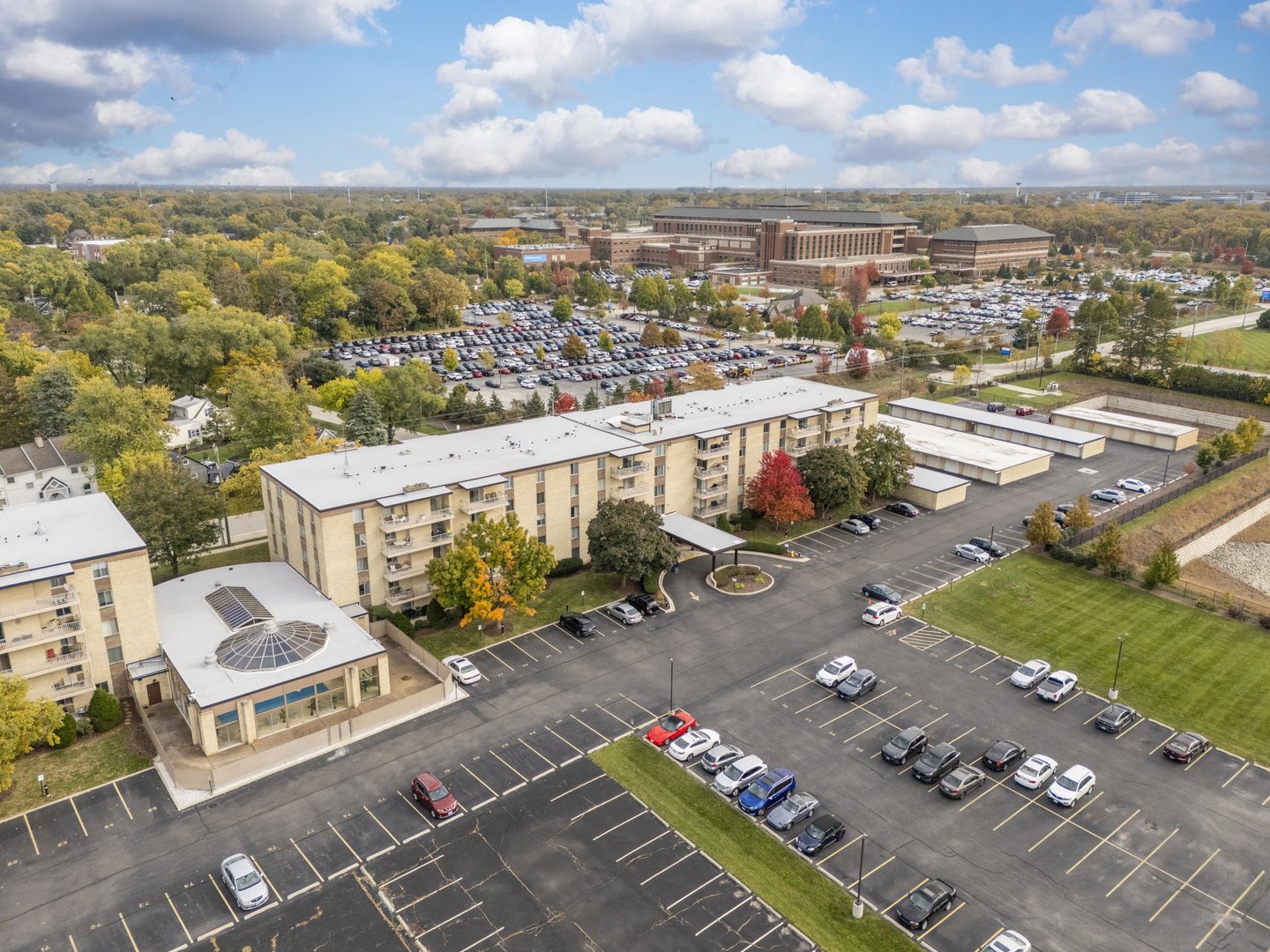 110 West Butterfield Road, Unit 502S Elmhurst, IL 60126 - Photo 26 of 31 an aerial view of a city with parking