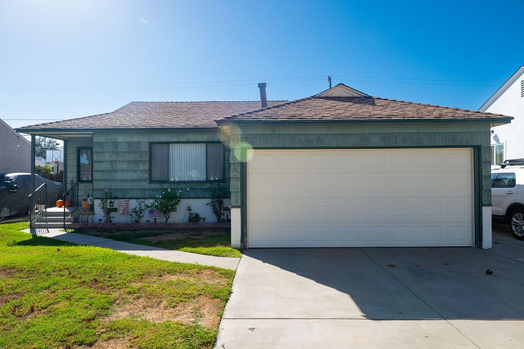 4403 Shadeway Road Lakewood, CA 90713 - Photo 23 of 34 Front exterior and lawn.