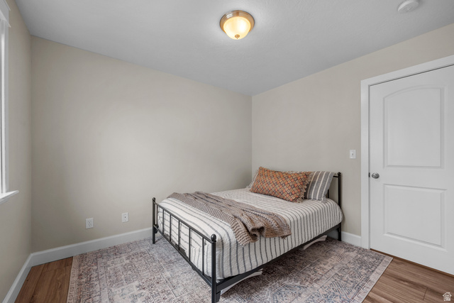 1896 West 800 North Mapleton, UT 84663 - Photo 20 of 55 Bedroom featuring baseboards and light wood-style floors