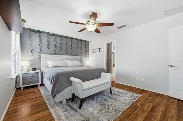 a bed room with a bed and a couch