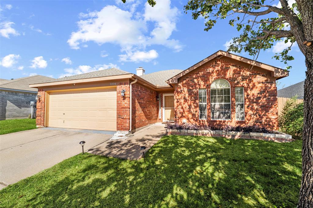5104 Valley Village Drive Fort Worth, TX 76123 - Photo 2 of 28 a view of a house with a small yard and a large tree