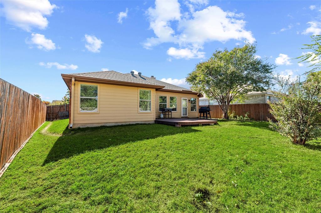 5104 Valley Village Drive Fort Worth, TX 76123 - Photo 24 of 28 a view of a house with backyard and garden