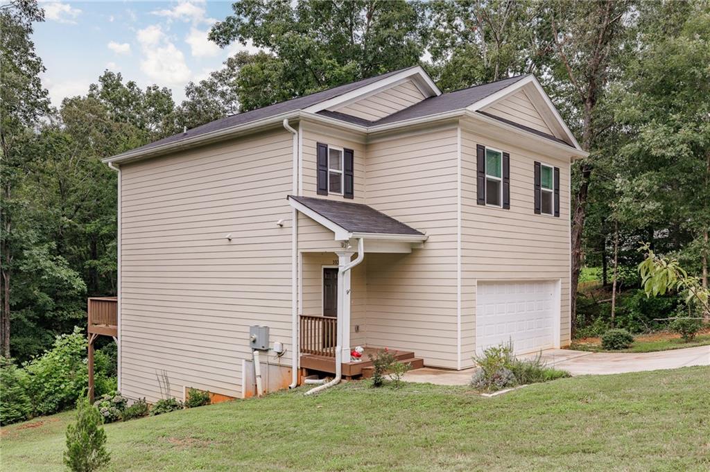 103 Three Rivers Court Hull, GA 30646 - Photo 2 of 40 a front view of a house with a yard