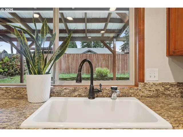 a view of a sink and window