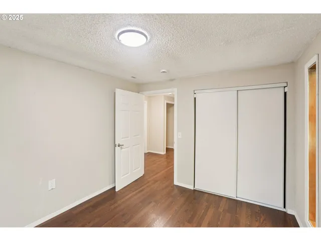 a view of a backyard with table and chairs with a backyard