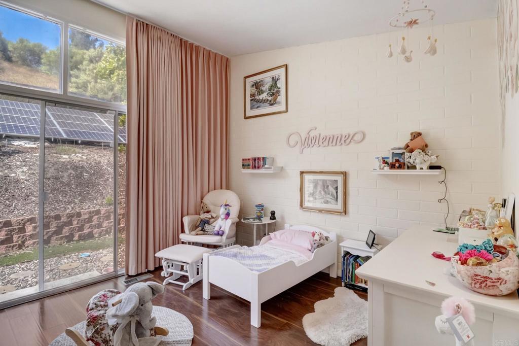 11615 Legendale Drive Lakeside, CA 92040 - Photo 17 of 33 a living room with furniture and a window