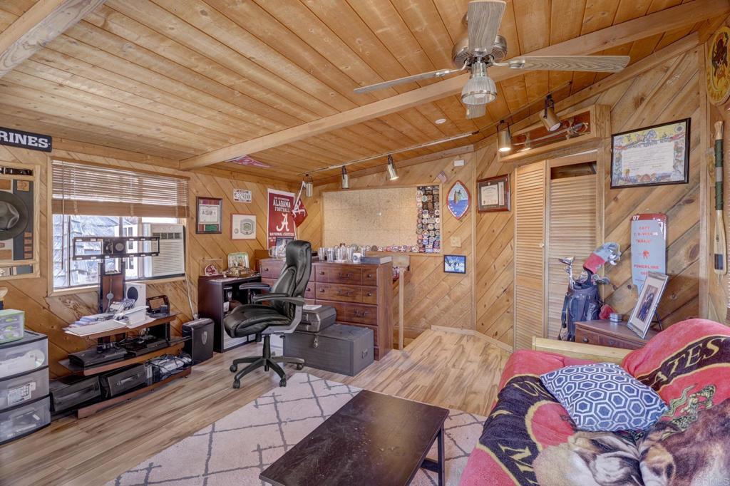 11615 Legendale Drive Lakeside, CA 92040 - Photo 21 of 33 a living room with lots of furniture and a rug