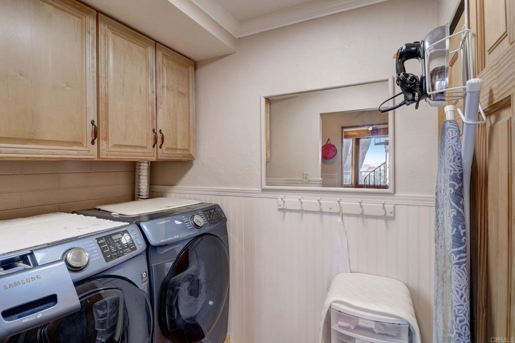 11615 Legendale Drive Lakeside, CA 92040 - Photo 22 of 33 a utility room with dryer and washer