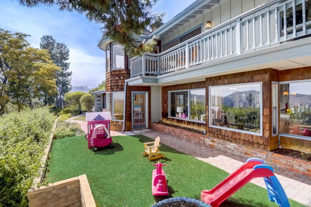 11615 Legendale Drive Lakeside, CA 92040 - Photo 28 of 33 a front view of a house with swimming pool and porch