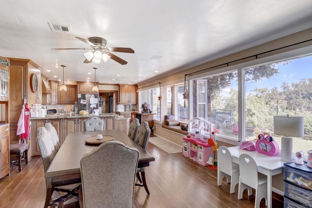 11615 Legendale Drive Lakeside, CA 92040 - Photo 7 of 33 a living room with lots of furniture and a chandelier