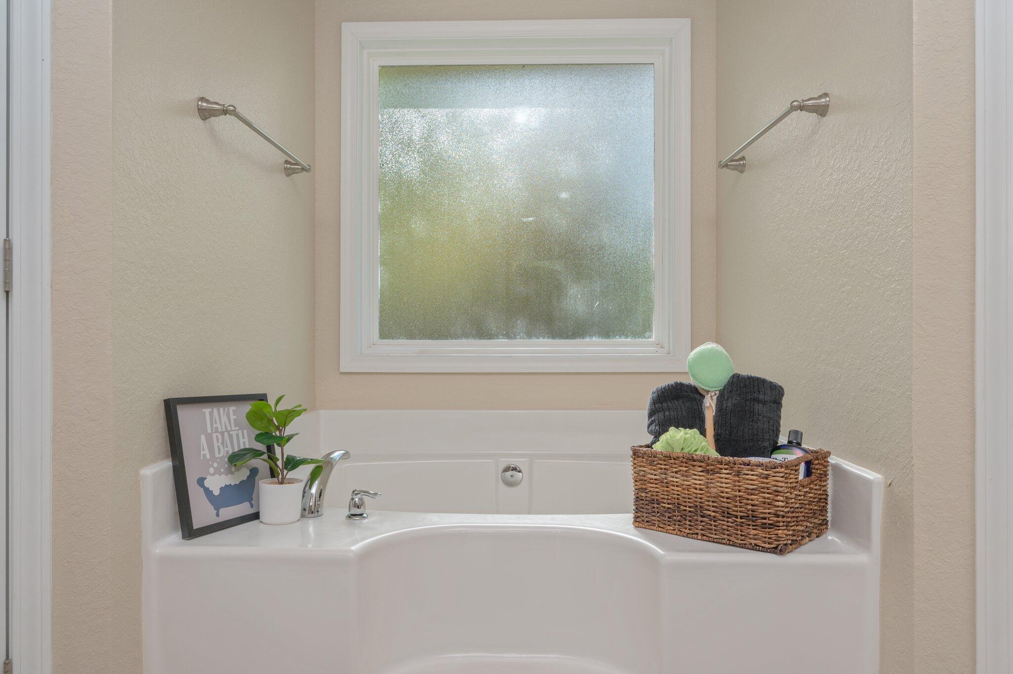 513 Vale Loop Crestview, FL 32536 - Photo 25 of 50 a bathroom with a tub shower vanity and a sink