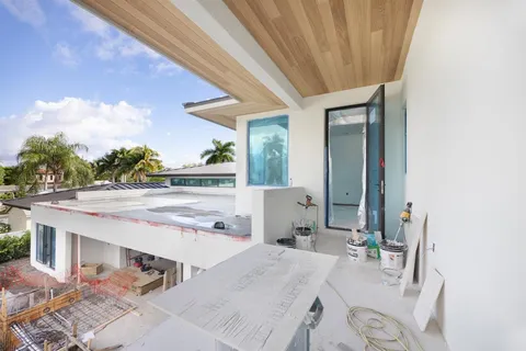 a workspace with furniture and a kitchen