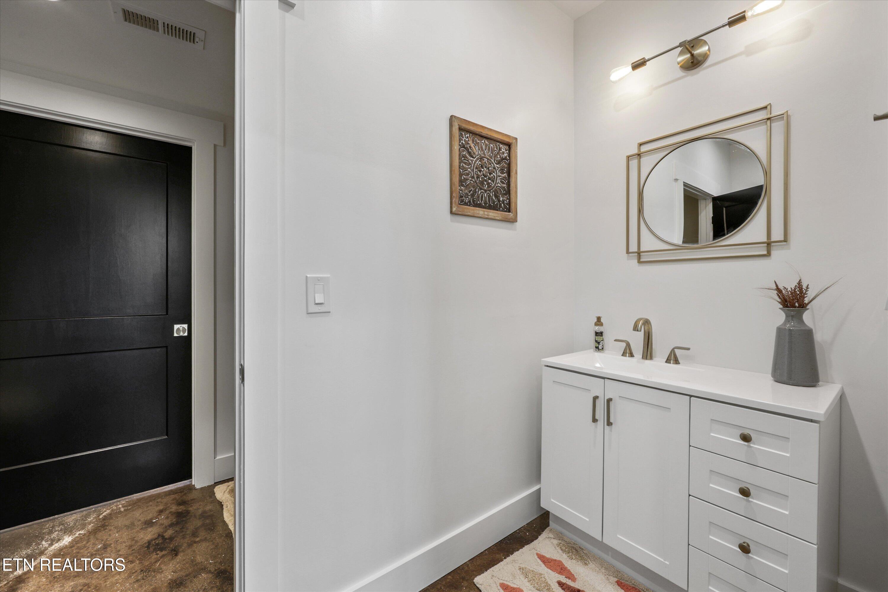 13161 Vonore Road Loudon, TN 37774 - Photo 21 of 38 Jack and Jill private powder room 1