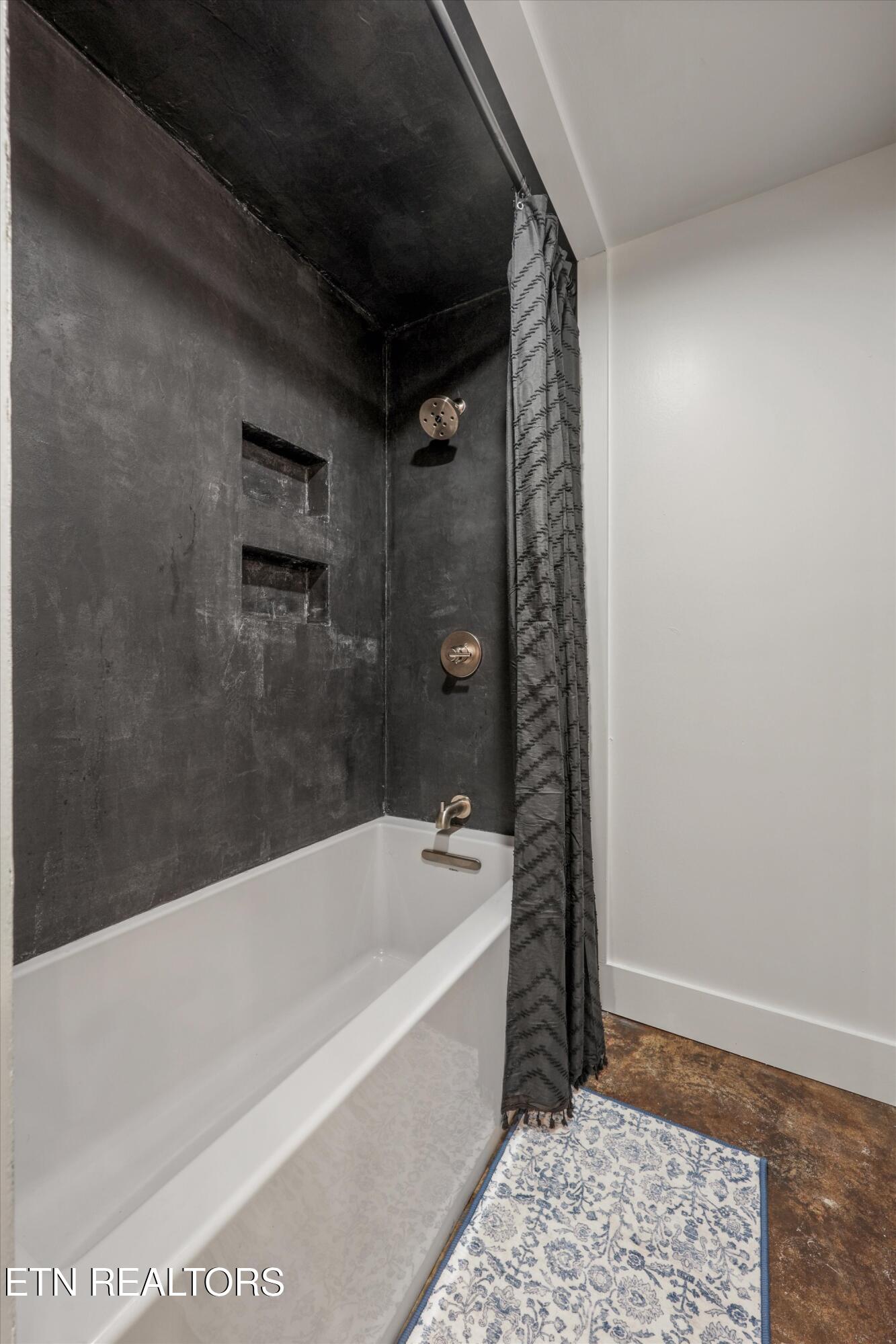 13161 Vonore Road Loudon, TN 37774 - Photo 30 of 41 4th bath tub/shower with micro cement