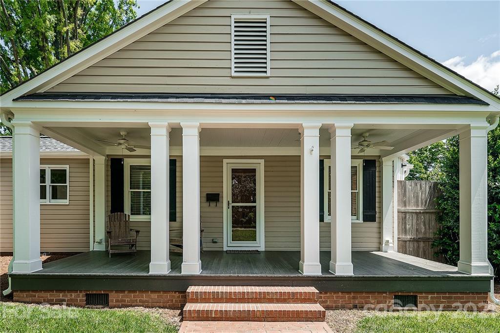 327 Marsh Road Charlotte, NC 28209 - Photo 2 of 48 a front view of a house with a porch
