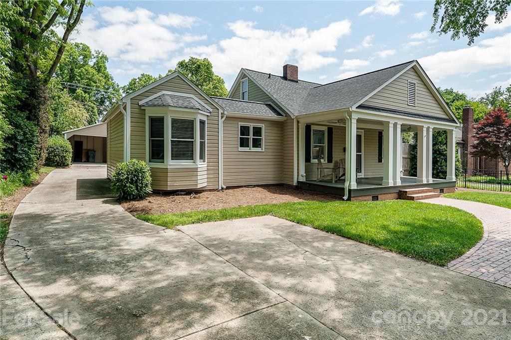 327 Marsh Road Charlotte, NC 28209 - Photo 3 of 48 a front view of a house with a yard