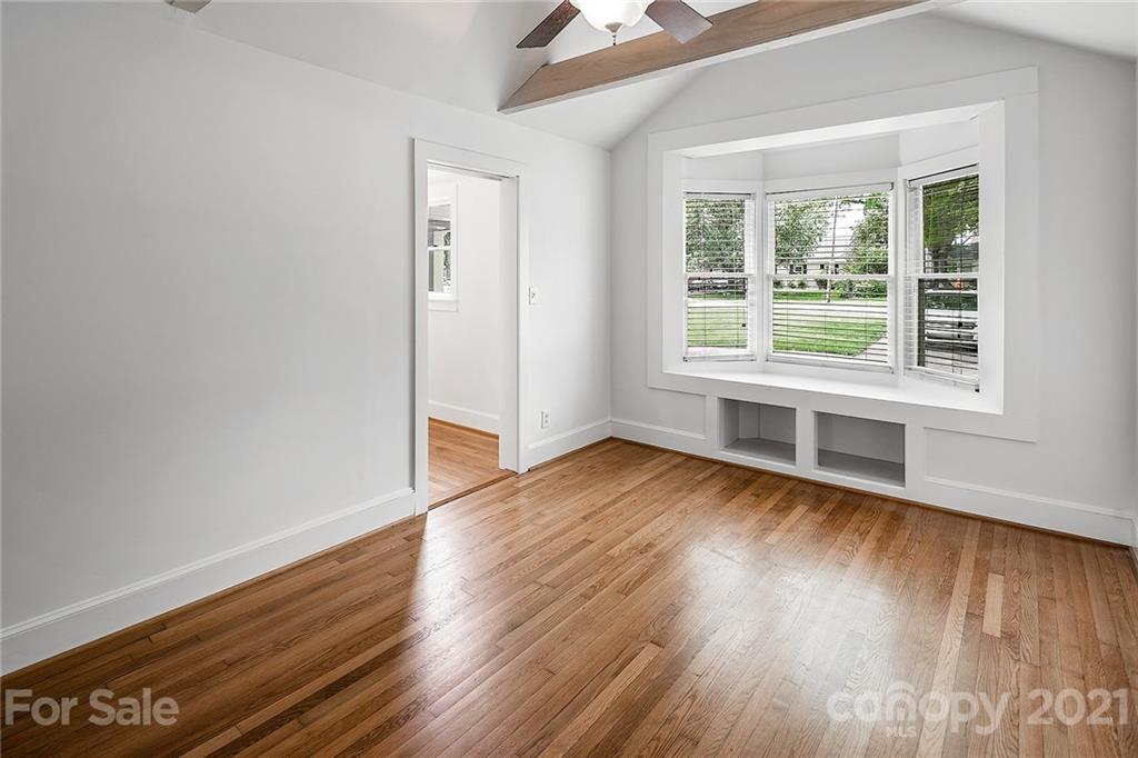 327 Marsh Road Charlotte, NC 28209 - Photo 29 of 48 a view of a room with wooden floor and window