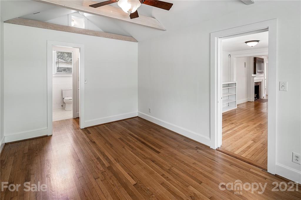 327 Marsh Road Charlotte, NC 28209 - Photo 30 of 48 wooden floor in an empty room with wooden floor