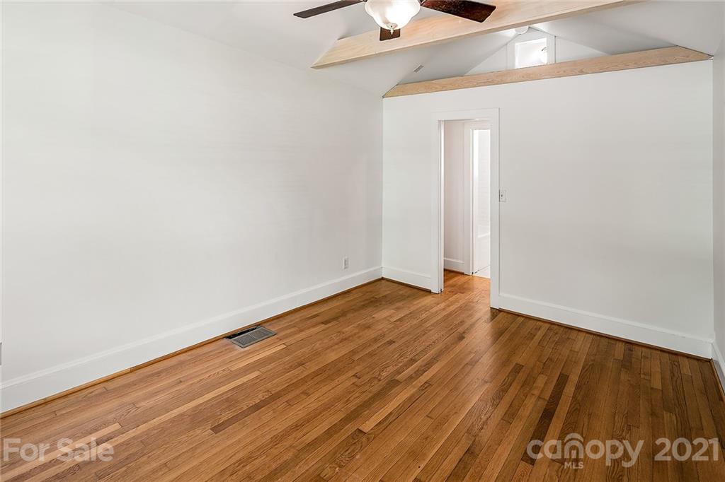 327 Marsh Road Charlotte, NC 28209 - Photo 31 of 48 a view of an empty room with wooden floor