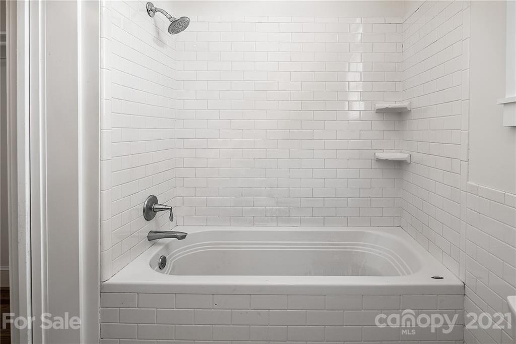 327 Marsh Road Charlotte, NC 28209 - Photo 33 of 48 a bathroom with a bathtub