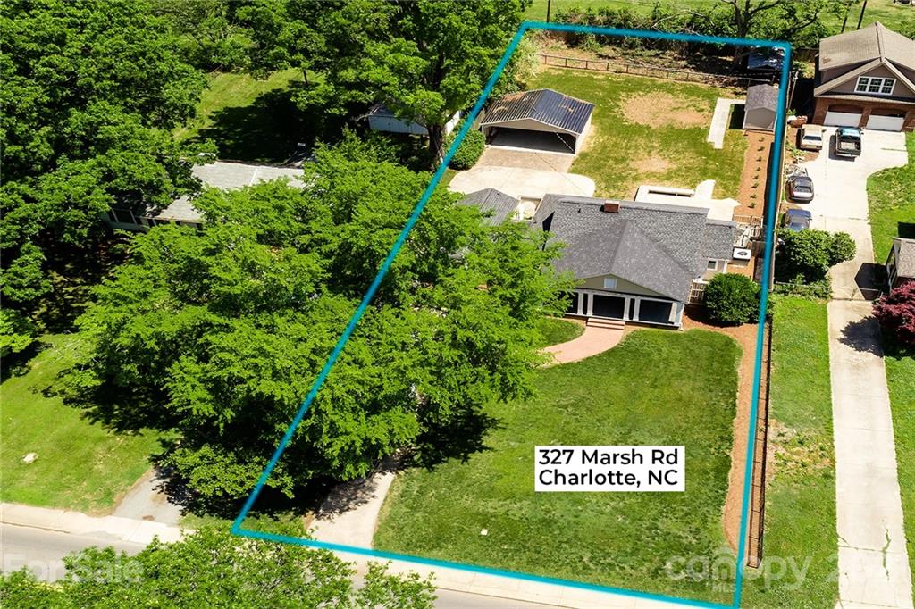327 Marsh Road Charlotte, NC 28209 - Photo 44 of 48 an aerial view of a house with a yard swimming pool and outdoor seating