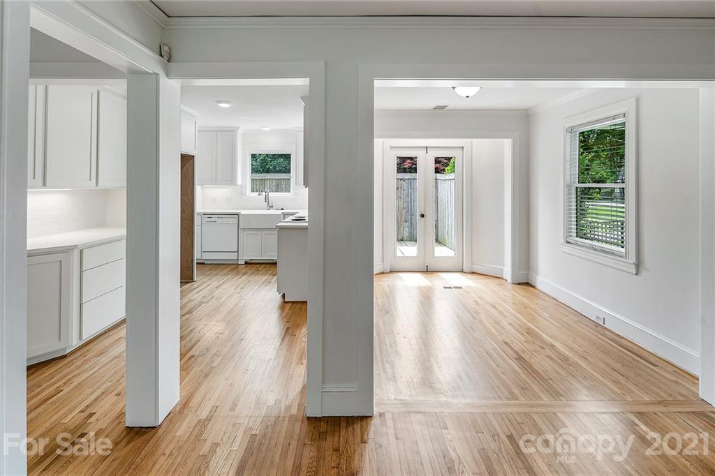 327 Marsh Road Charlotte, NC 28209 - Photo 10 of 48 a view of a living room with hardwood floor and a window