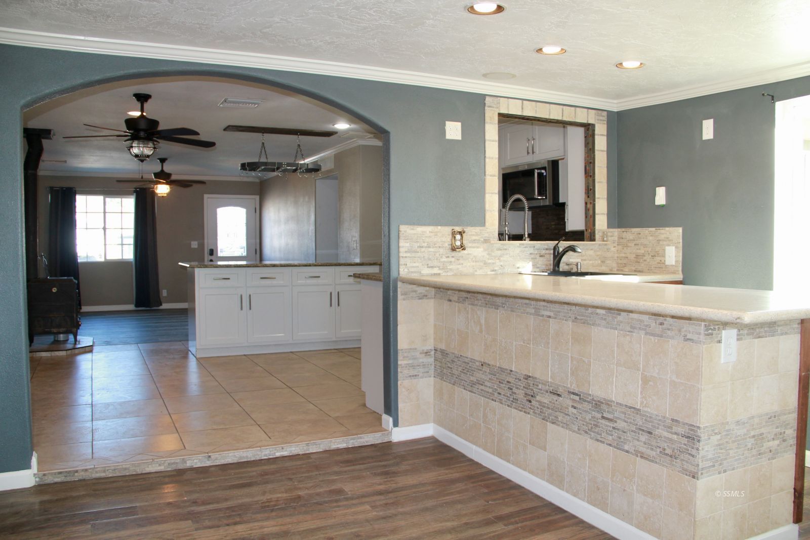 333 Traci Lane Ridgecrest, CA 93555 - Photo 10 of 30 a bathroom with a sink a large mirror and a shower