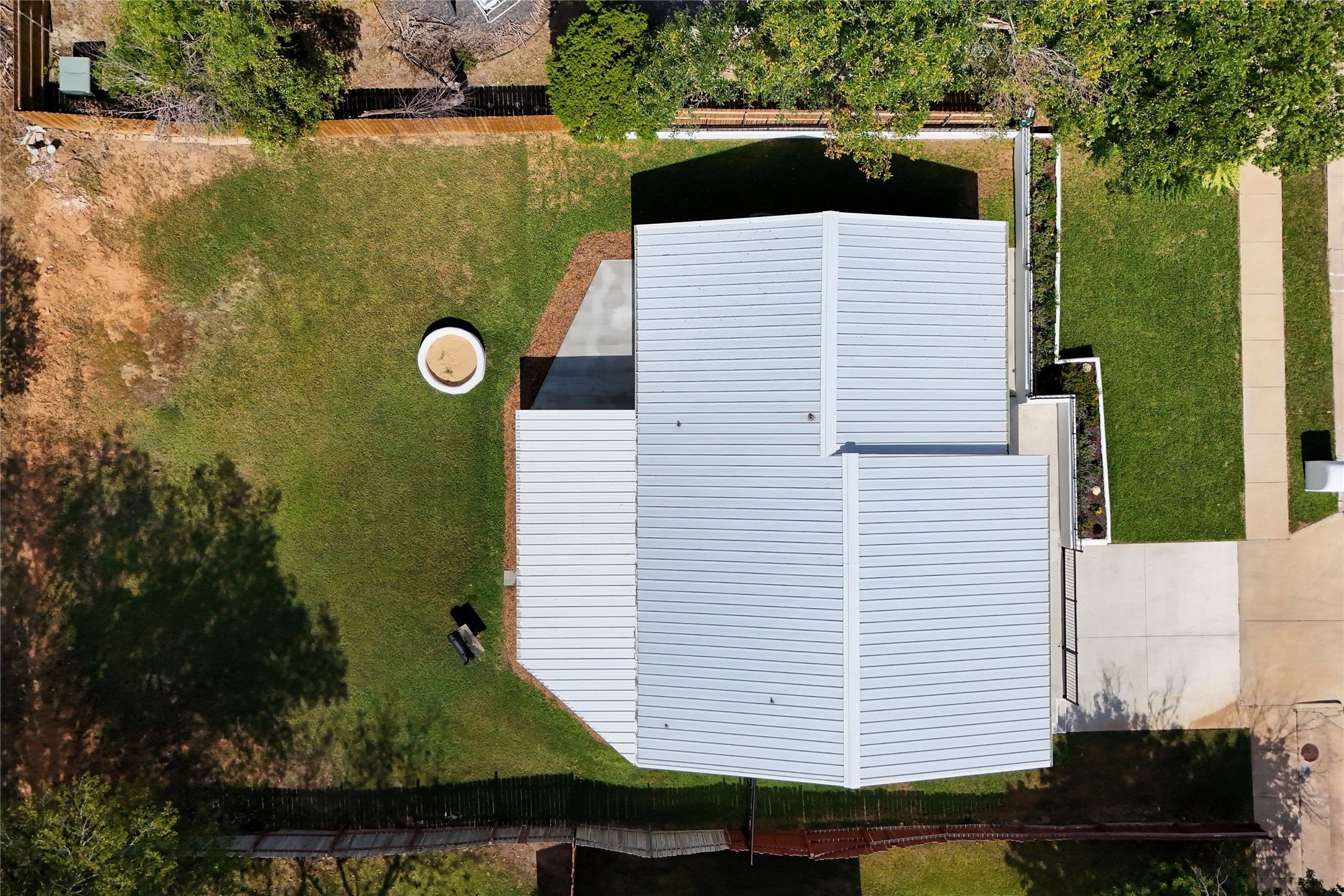 8007 Colony Loop Drive Austin, TX 78724 - Photo 37 of 40 Aerial view showing the full .19-acre lot, open backyard space, and fire pit area — room to host, relax, and actually enjoy outdoor living.