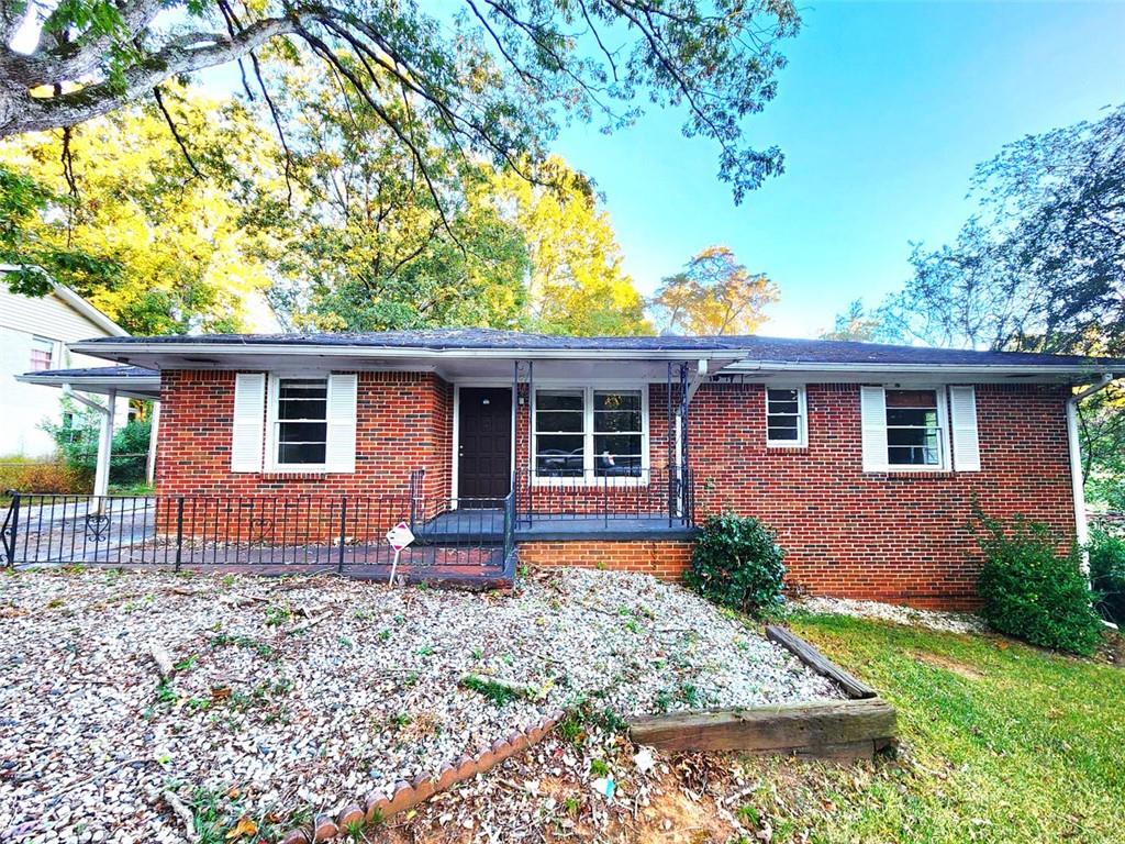 3542 North Druid Hills Road Northeast Decatur, GA 30033 - Photo 1 of 1 front view of a house with a yard