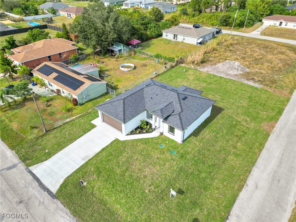 3602 20th Street Southwest Lehigh Acres, FL 33976 - Photo 11 of 40 an aerial view of a house